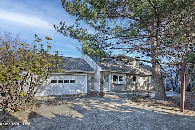 415 Parkview Ave, Ocean Twp, NJ 07712 - view of front of home with a garage, roof with shingles, and driveway