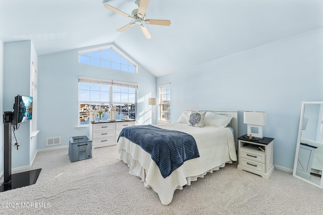 bedroom with vaulted ceiling, a ceiling fan, light colored carpet, baseboards, and visible vents