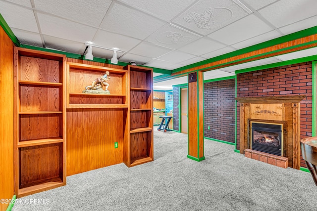 461 Harmony Rd, Jackson, NJ 08527 - unfurnished living room featuring carpet, a paneled ceiling, and a tile fireplace