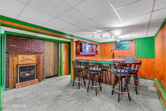 461 Harmony Rd, Jackson, NJ 08527 - dining area featuring bar, carpet, a drop ceiling, rail lighting, and a large fireplace