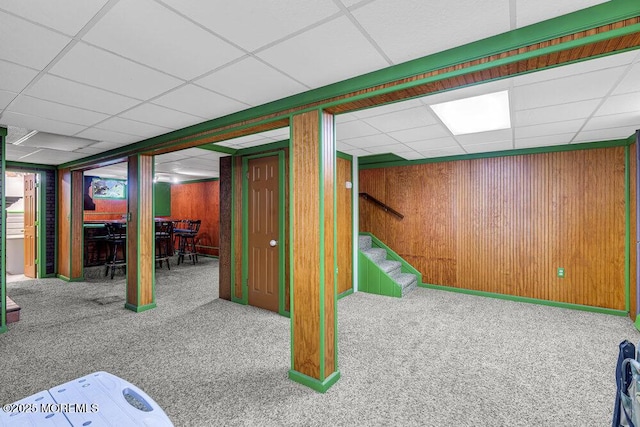 461 Harmony Rd, Jackson, NJ 08527 - finished below grade area featuring a drop ceiling, carpet flooring, stairway, and wooden walls