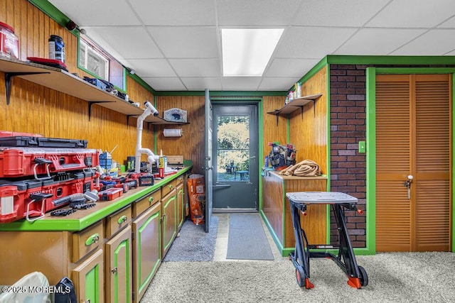 461 Harmony Rd, Jackson, NJ 08527 - misc room with light colored carpet, a paneled ceiling, and wood walls