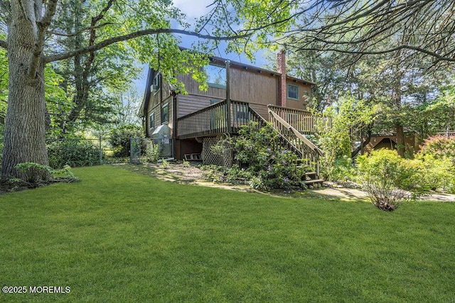 461 Harmony Rd, Jackson, NJ 08527 - rear view of house with a chimney, stairs, and a wooden deck