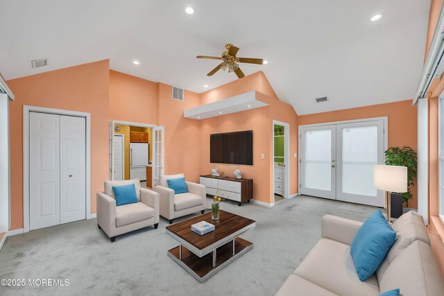 9 Maplewood Ave, Keansburg, NJ 07734 - living area featuring french doors, lofted ceiling, carpet, and visible vents