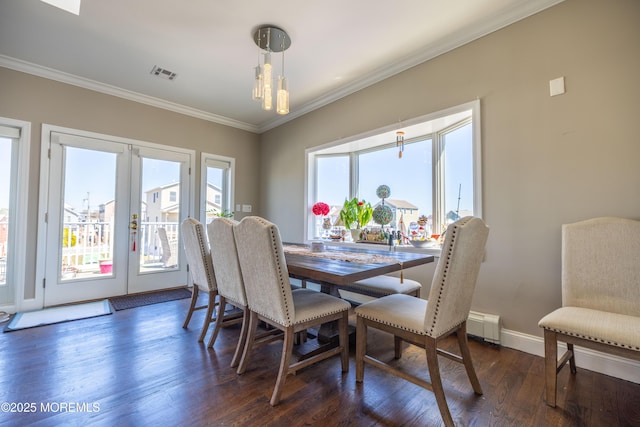 dining room with french doors, dark wood finished floors, baseboards, visible vents, and crown molding