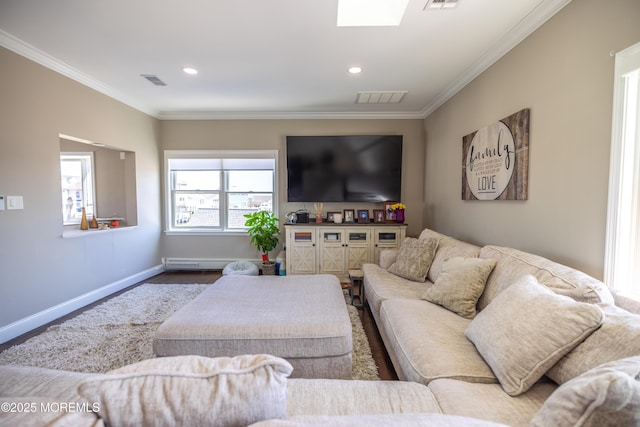 living room featuring crown molding and visible vents