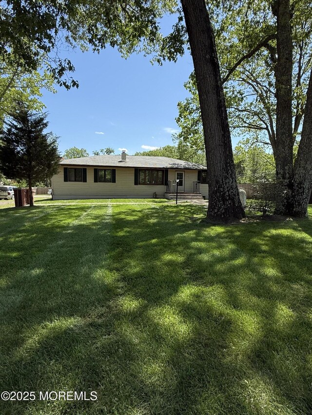 185 W Commodore Blvd, Jackson, NJ 08527 - back of house with a yard