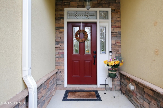 26 Aspen Ln, Tinton Falls, NJ 07724 - property entrance with stone siding and stucco siding