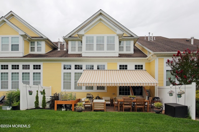 26 Aspen Ln, Tinton Falls, NJ 07724 - rear view of property featuring a lawn and a patio area