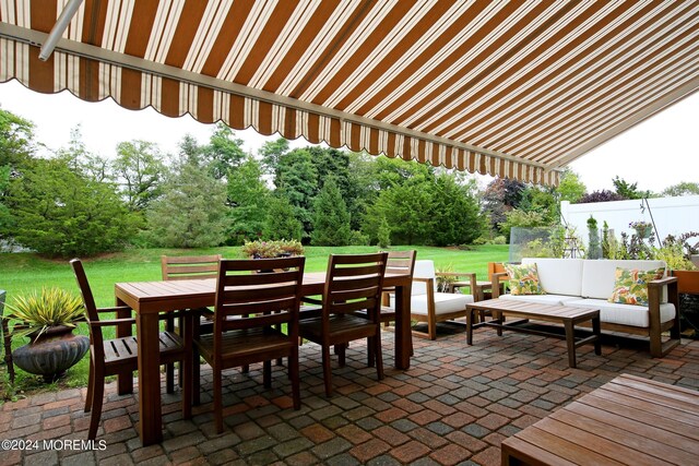 26 Aspen Ln, Tinton Falls, NJ 07724 - view of patio featuring an outdoor living space and outdoor dining area