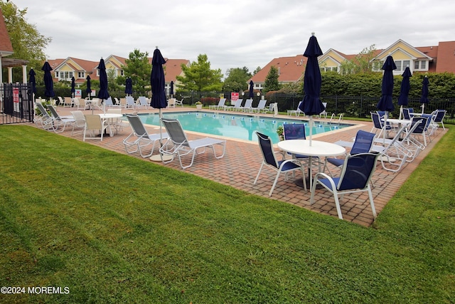 26 Aspen Ln, Tinton Falls, NJ 07724 - pool featuring a patio area, a yard, fence, and a residential view
