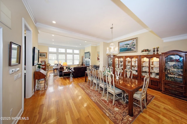 26 Aspen Ln, Tinton Falls, NJ 07724 - dining space featuring ornamental molding, recessed lighting, light wood-type flooring, and a chandelier
