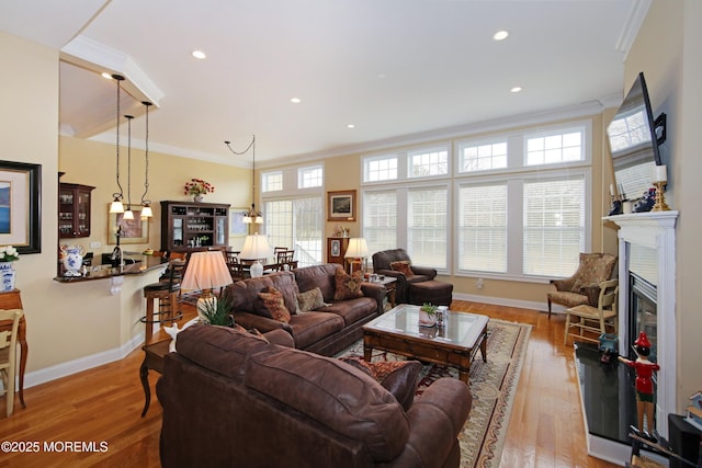 26 Aspen Ln, Tinton Falls, NJ 07724 - living room with crown molding, recessed lighting, baseboards, and light wood finished floors