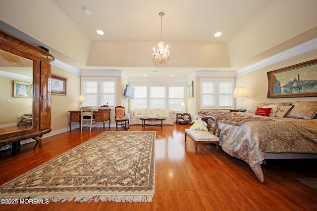 26 Aspen Ln, Tinton Falls, NJ 07724 - bedroom featuring recessed lighting, a high ceiling, an inviting chandelier, and wood finished floors