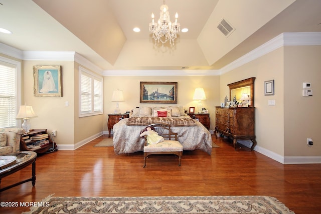 26 Aspen Ln, Tinton Falls, NJ 07724 - bedroom with a notable chandelier, visible vents, multiple windows, and wood finished floors