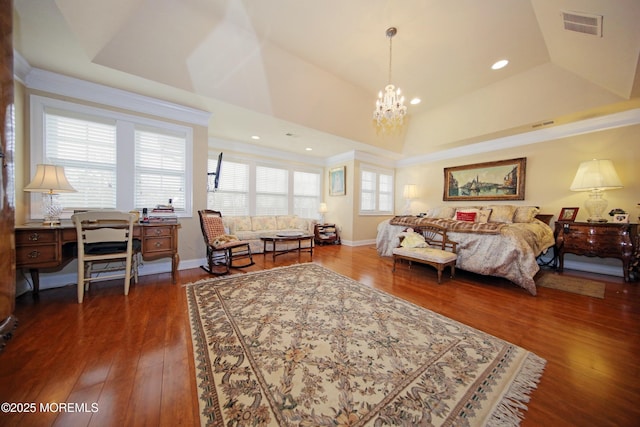26 Aspen Ln, Tinton Falls, NJ 07724 - bedroom featuring visible vents, baseboards, a tray ceiling, an inviting chandelier, and hardwood / wood-style flooring