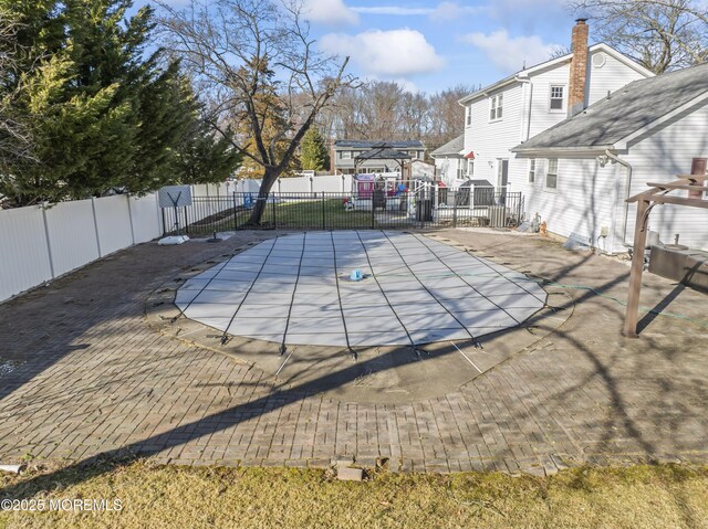 4 Whitman Rd, Morganville, NJ 07751 - view of swimming pool featuring a fenced in pool, a patio, and fence