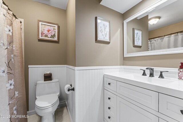 4 Whitman Rd, Morganville, NJ 07751 - full bath with wainscoting, toilet, and vanity