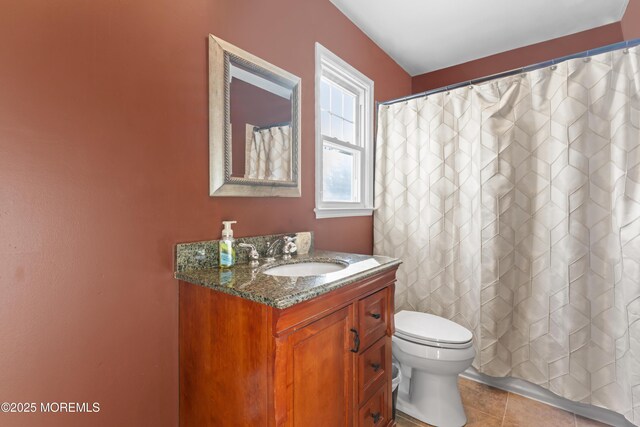 4 Whitman Rd, Morganville, NJ 07751 - full bathroom with tile patterned flooring, curtained shower, toilet, and vanity