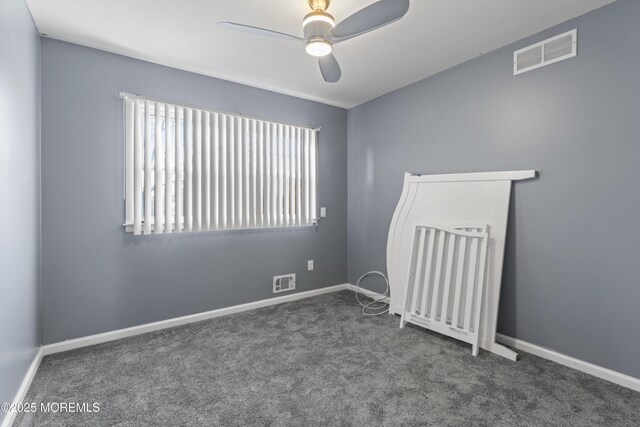 4 Whitman Rd, Morganville, NJ 07751 - empty room featuring visible vents, baseboards, carpet, and ceiling fan