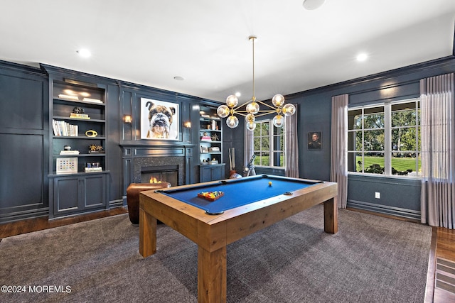 20 Conover Ln, Rumson, NJ 07760 - rec room featuring built in shelves, dark wood-type flooring, crown molding, a glass covered fireplace, and billiards