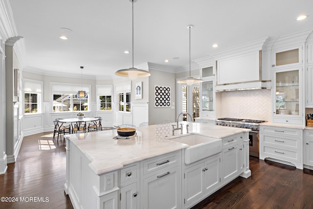 20 Conover Ln, Rumson, NJ 07760 - kitchen with dark wood-style floors, high end stainless steel range oven, white cabinetry, and a sink