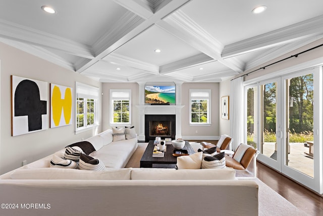 20 Conover Ln, Rumson, NJ 07760 - living area featuring beam ceiling, coffered ceiling, a warm lit fireplace, and plenty of natural light