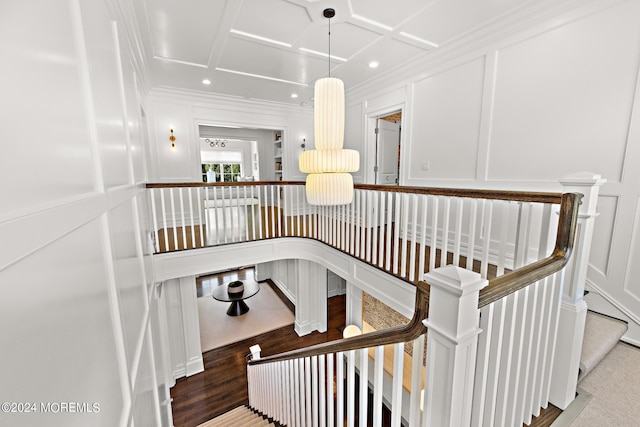 20 Conover Ln, Rumson, NJ 07760 - stairway featuring recessed lighting, coffered ceiling, crown molding, and a decorative wall