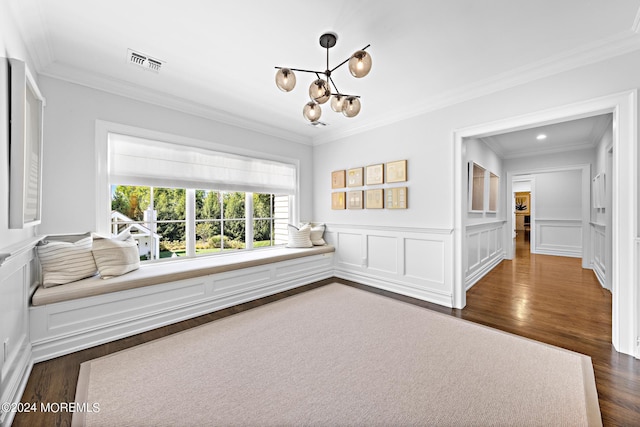 20 Conover Ln, Rumson, NJ 07760 - unfurnished dining area featuring dark wood-style floors, a chandelier, crown molding, visible vents, and a decorative wall