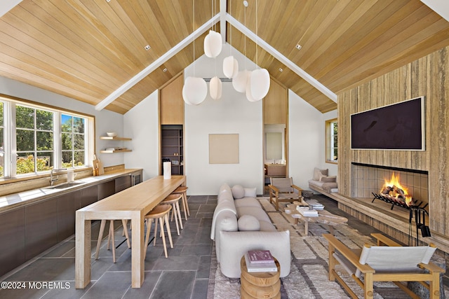 20 Conover Ln, Rumson, NJ 07760 - living room featuring wooden ceiling, lofted ceiling with beams, stone finish flooring, and a fireplace