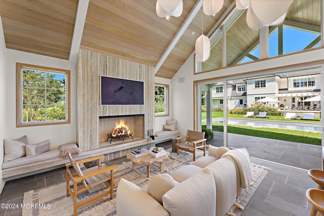 20 Conover Ln, Rumson, NJ 07760 - living room with wood ceiling, a healthy amount of sunlight, vaulted ceiling with beams, and a fireplace