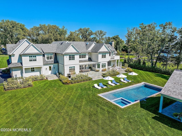 20 Conover Ln, Rumson, NJ 07760 - back of property featuring a yard, a patio, an outdoor pool, and a chimney