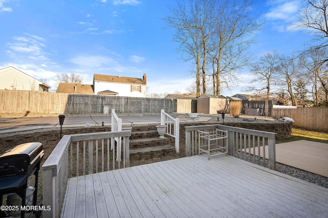1107 Frontage Rd, Toms River, NJ 08753 - deck featuring a fenced backyard, a patio area, an outdoor structure, and a shed