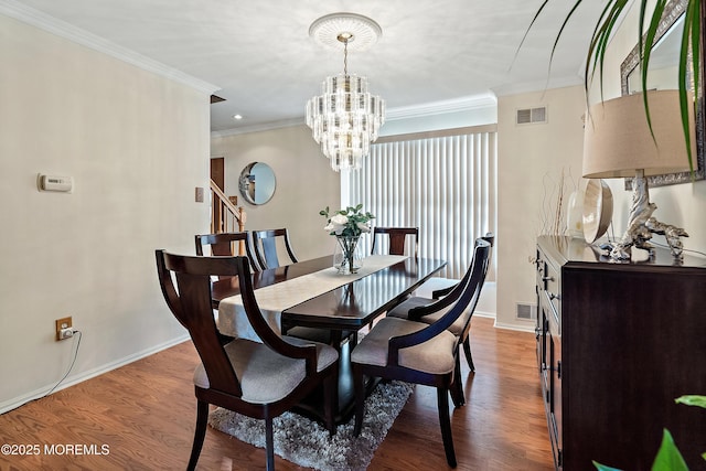 1107 Frontage Rd, Toms River, NJ 08753 - dining room featuring visible vents, baseboards, wood finished floors, and crown molding