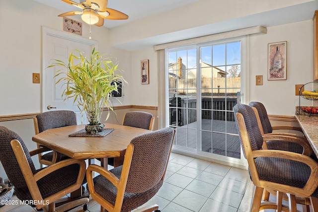 1107 Frontage Rd, Toms River, NJ 08753 - dining area with light tile patterned floors and ceiling fan