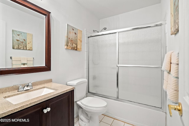 1107 Frontage Rd, Toms River, NJ 08753 - full bathroom with vanity, toilet, tile patterned flooring, and enclosed tub / shower combo