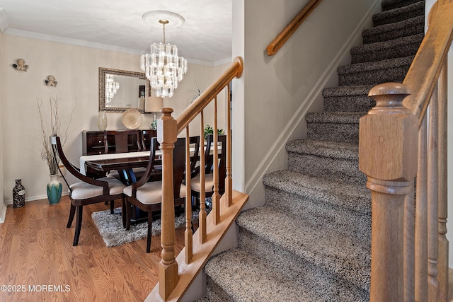 1107 Frontage Rd, Toms River, NJ 08753 - stairway with baseboards, an inviting chandelier, wood finished floors, and crown molding