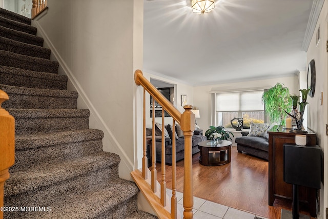 1107 Frontage Rd, Toms River, NJ 08753 - stairs featuring tile patterned floors, baseboards, and ornamental molding