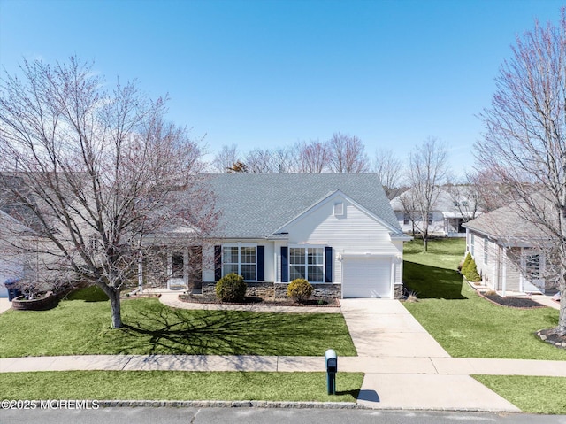 view of front facade featuring a front lawn, stone siding, driveway, and a shingled roof