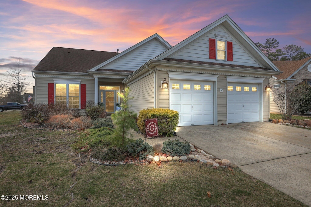 22 Hazeltine Ln, Jackson, NJ 08527 - traditional home with driveway and a garage