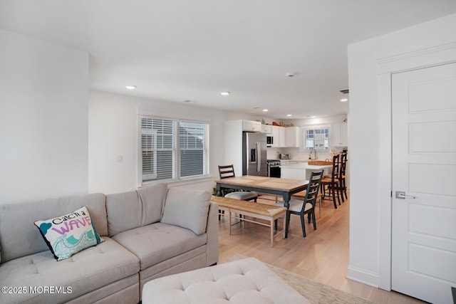 30 Elder St, Mantoloking, NJ 08738 - living area with recessed lighting and light wood-style flooring