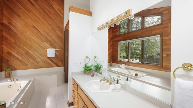bathroom with wood walls, a garden tub, vanity, tile patterned flooring, and a towering ceiling