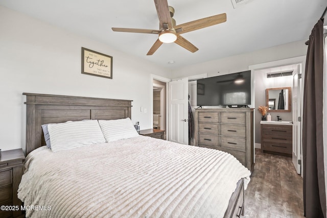 bedroom featuring wood finished floors and a ceiling fan