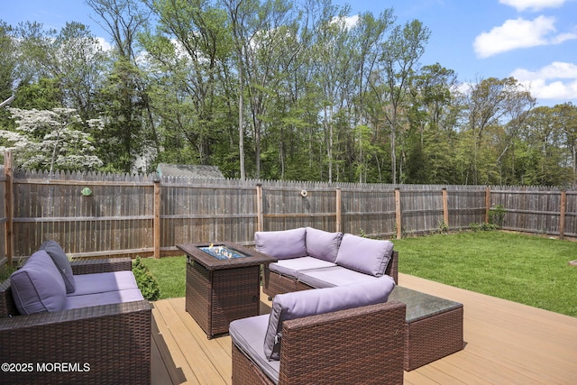 wooden terrace with an outdoor hangout area