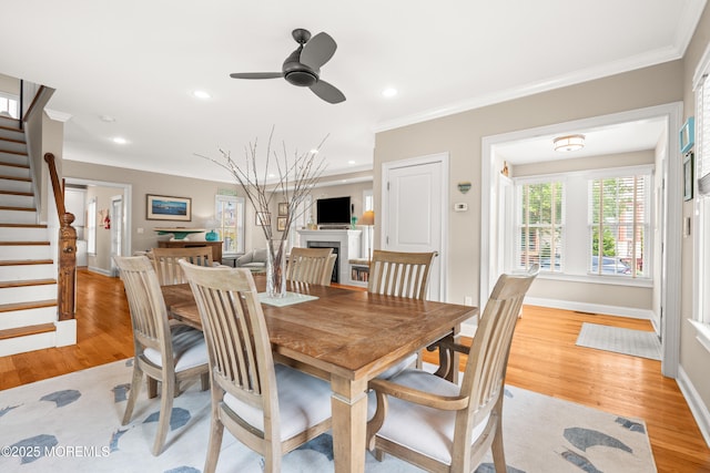 91 Cookman Ave, Ocean Grove, NJ 07756 - dining space featuring stairway, light wood-style floors, crown molding, plenty of natural light, and recessed lighting