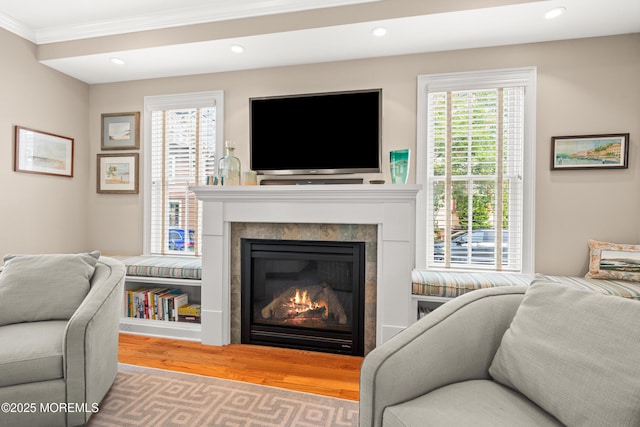 91 Cookman Ave, Ocean Grove, NJ 07756 - living room featuring wood finished floors, a fireplace, crown molding, and recessed lighting