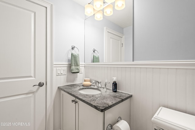 91 Cookman Ave, Ocean Grove, NJ 07756 - bathroom featuring vanity, a wainscoted wall, toilet, and a chandelier