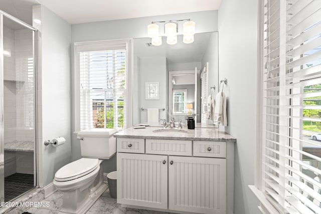 91 Cookman Ave, Ocean Grove, NJ 07756 - full bathroom featuring marble look tile flooring, vanity, a chandelier, and a stall shower