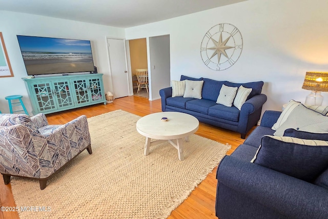 living room with wood finished floors