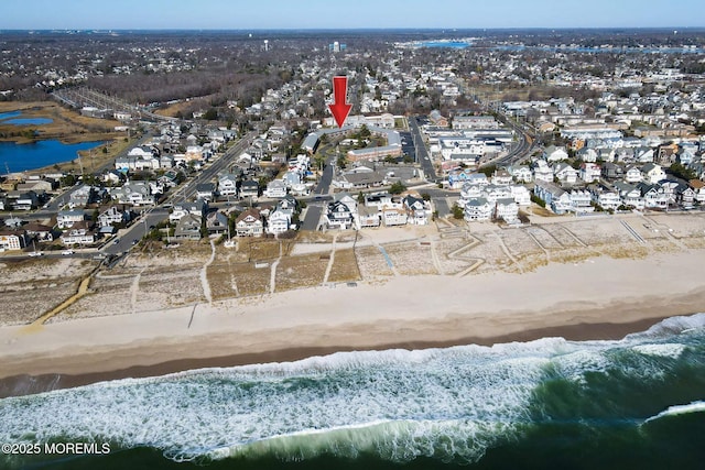 aerial view with a residential view and a water view